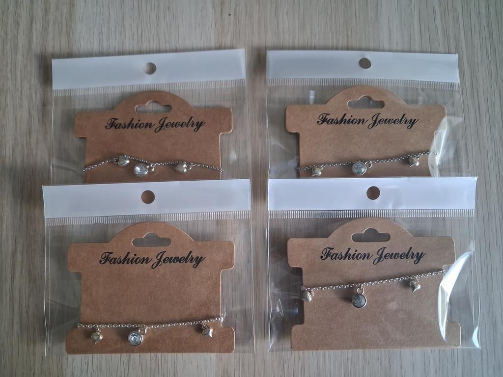 4x Kinderbedelarmbandjes - Zilverkleurig en Wit, Sieraden, Tassen en Uiterlijk, Kindersieraden, Nieuw, Armband, Wit, Ophalen of Verzenden