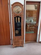 Staande klok., Ophalen