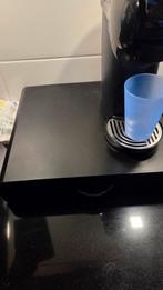 Koffiecup houder, wie o wie haalt hem op!, Ophalen