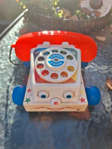 Zgan Fisher price Telefoon  bewegende oogjes en rinkel beschikbaar voor biedingen