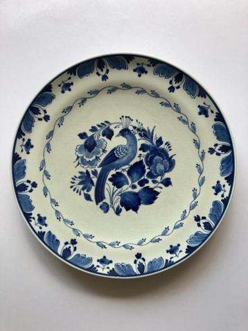 Delfts Blauw wandbord met paradijsvogel (1926) beschikbaar voor biedingen