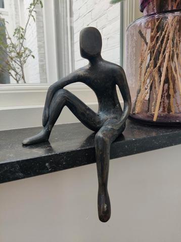Bronzen zittende man ( rand zitter) beschikbaar voor biedingen