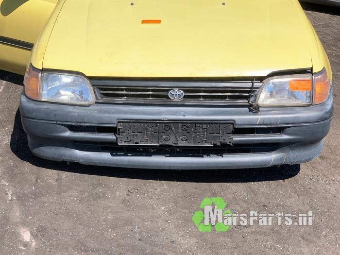 Voorbumper van een Toyota Starlet, Auto-onderdelen, Carrosserie en Plaatwerk, Bumper, Toyota, Gebruikt, 3 maanden garantie, Ophalen of Verzenden