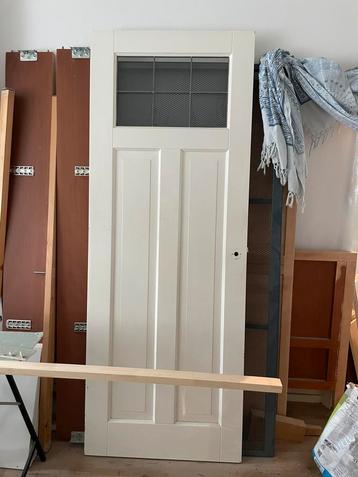 Massief houten binnen deur met glas in lood beschikbaar voor biedingen