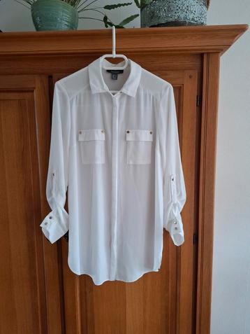 Witte blouse  beschikbaar voor biedingen