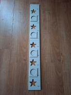 Witte meetlat met foto's, Ophalen