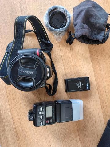 Nikon D40x met 16-135mm lens en flitser beschikbaar voor biedingen