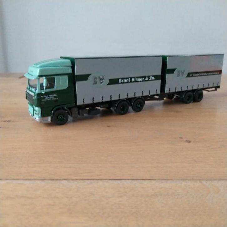 Lion Car DAF XF schuifzeilen combi BRANT VISSER HEERENVEEN, Hobby en Vrije tijd, Modelauto's | 1:50, Bus of Vrachtwagen, Lion Toys