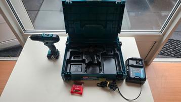 Makita schroefmachine,Boormachine accu Oplader doos  Werk ok beschikbaar voor biedingen