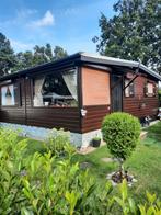 CHALET TE KOOP .CHALET BLIJFT STAAN OP DE CAMPING..