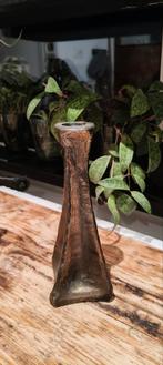 Bronzen kandelaar van Hermann Pedit, Ophalen