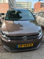 Volkswagen Touran 1.6 TDI 77KW Cross 2011 Bruin, Auto's, 4 cilinders, Bruin, 7 stoelen, 1485 kg