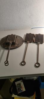 Wafelijzers, Ophalen