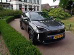 TOYOTA Yaris Cross 1.5 VVT-I Hybrid 130pk CVT Dynamic Team E, Auto's, 12 maanden, Stof, Gebruikt, 550 kg