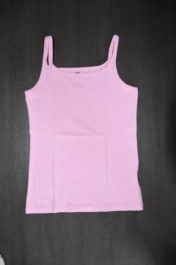 Roze top van H&M beschikbaar voor biedingen