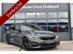 BMW 3 Serie Touring 330e xDrive M-Sport 292 Pk Dravit Grijs, Gebruikt, 4 cilinders, 1865 kg, Vierwielaandrijving