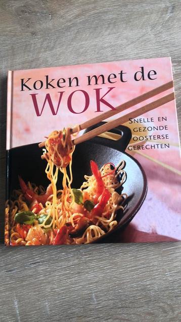 Koken met de wok. beschikbaar voor biedingen