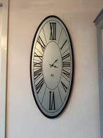 Arti & Mestieri design. Ovale wandklok, Huis en Inrichting, Woonaccessoires | Klokken, Ophalen of Verzenden, Zo goed als nieuw