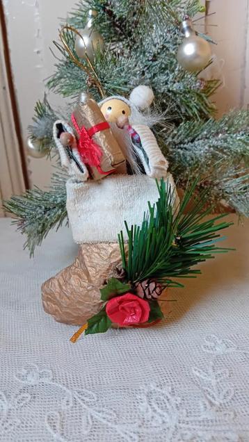 Kerstsok met popje beschikbaar voor biedingen