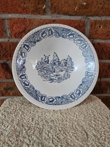 Oud bord met blauwe Hollandse voorstelling beschikbaar voor biedingen