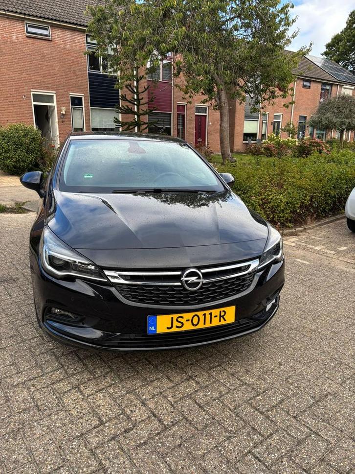 Opel Astra 1.0 Turbo 77KW 5D 2016 Zwart, Auto's, Opel, Particulier, Astra, Airbags, Apple Carplay, Bluetooth, Cruise Control, Elektrische ramen