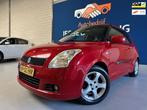 Suzuki Swift 1.3 Exclusive/kleur:rood/Airco/Sportvelgen/Nieu, Stof, Gebruikt, 400 kg, Swift