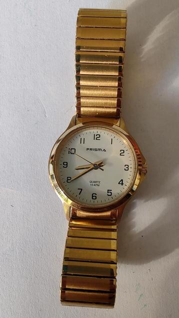 Prisma quarts horloge beschikbaar voor biedingen