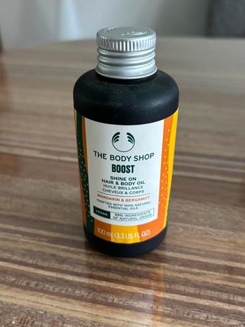 "Boost shine on hair & body oil" van The Body Shop beschikbaar voor biedingen