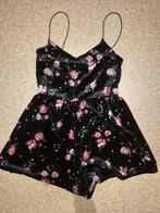 Zwarte bloemen romper - H&M Divided, Kleding | Dames, Zwart, H&M Divided, Ophalen of Verzenden, Zo goed als nieuw