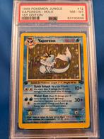 Vaporeon 12/64 - Jungle (1st edition) (PSA 8), Verzenden, Gebruikt