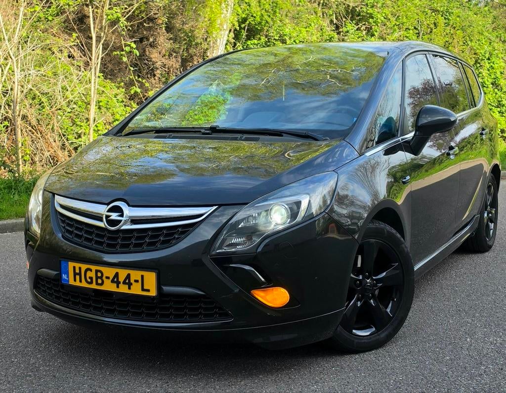 Opel Zafira 1.4 T/AUT/7P/Sport/Bi-Xenon/Navi/Pano/Zwart/Leer, Auto's, Zwart, Zwart, Leder, 1400 cc