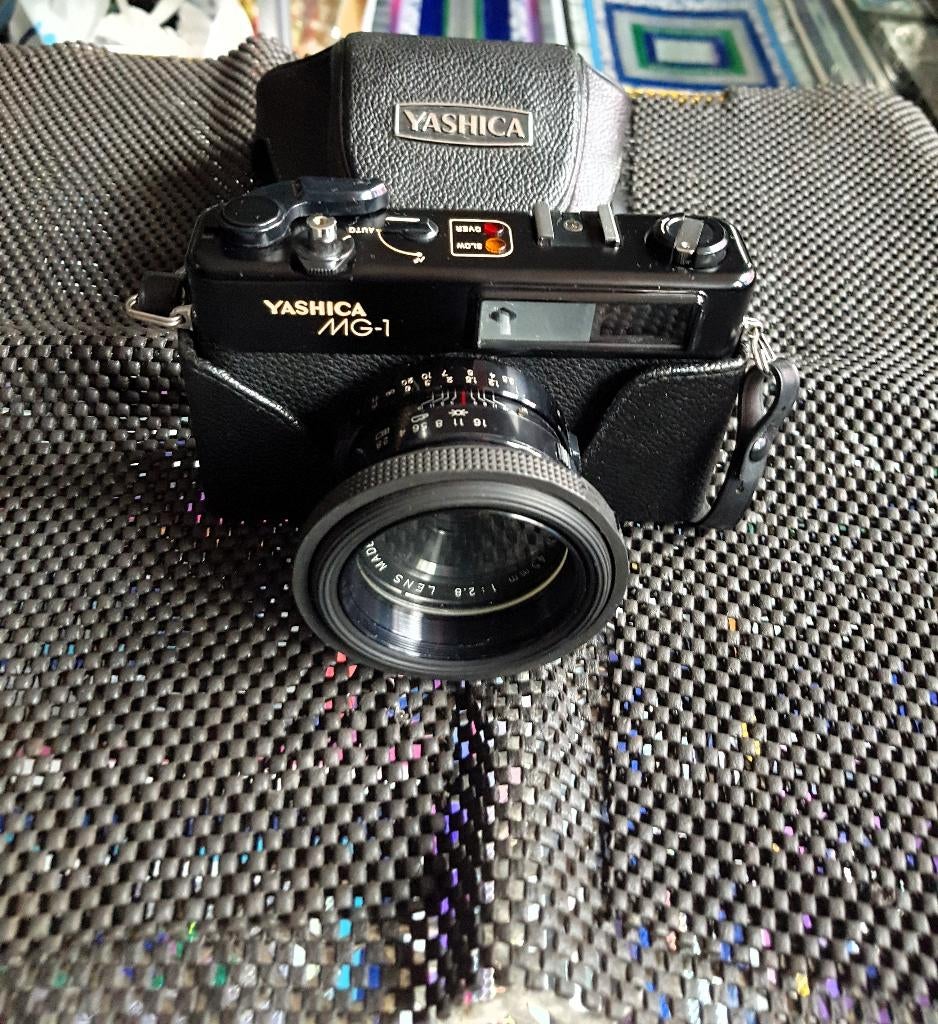 Yashica MG-1 35mm filmcamera met meetzoeker, Ophalen of Verzenden, Gebruikt, Compact, Overige Merken