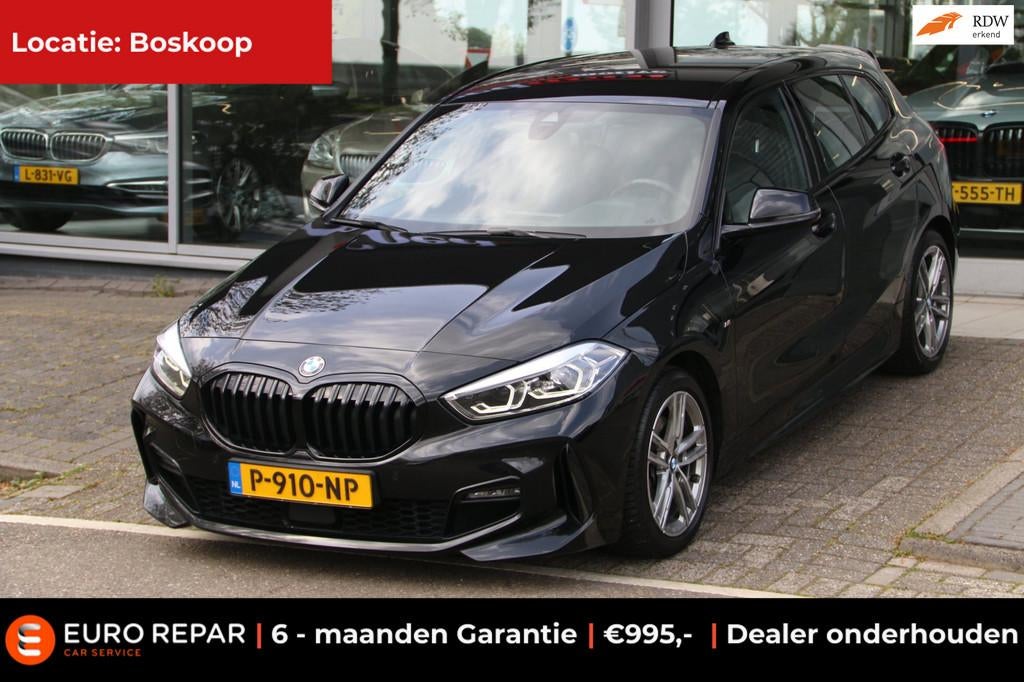 BMW 1-serie 118i Business Edition M-PAKKET DEALER OND NL-AUT, 136 pk, Gebruikt, Leder en Stof, Zwart