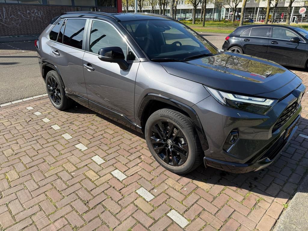 Toyota Rav4 2.5 Hybrid CVT 2024 Grijs, Auto's, Toyota, Zwart, 4 cilinders, 2487 cc, Rav4