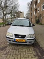 Hyundai Matrix 1.6 2006 Grijs, Voorwielaandrijving, Stof, 1599 cc, 4 cilinders