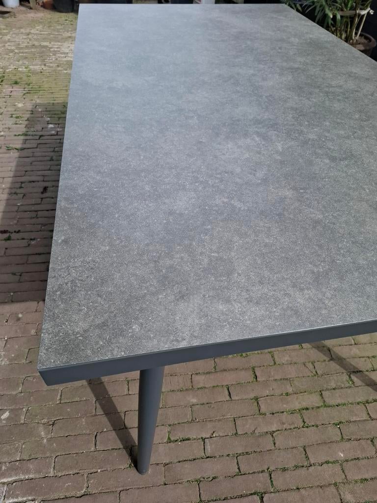 Tuintafel met glazenplaat, Ophalen