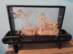 kurk snijkunst in vitrine, Ophalen