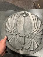 Commandos plaquette, Ophalen