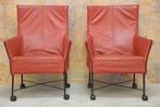 IZG Staat 2 rode leren verrijdbare Montis Charly fauteuils