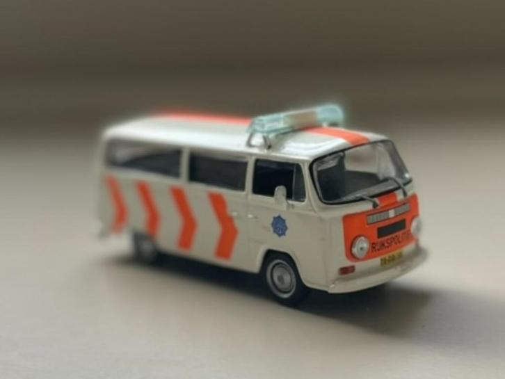 4 modellen uit collectie "Politiewagens van de wereld" 1:43, Hobby en Vrije tijd, Modelauto's | 1:43, Gebruikt, Auto, Overige merken