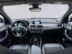 BMW X1 SDrive20i 192 pk High Executive, panoramadak, trekhaa, 1998 cc, Euro 6, Leder en Stof, Zwart