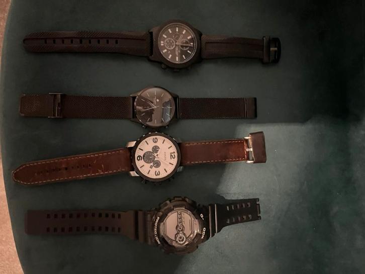 Horloges, Sieraden, Tassen en Uiterlijk, Horloges | Heren, Gebruikt, Polshorloge, Overige merken, Staal, Leer, Ophalen of Verzenden