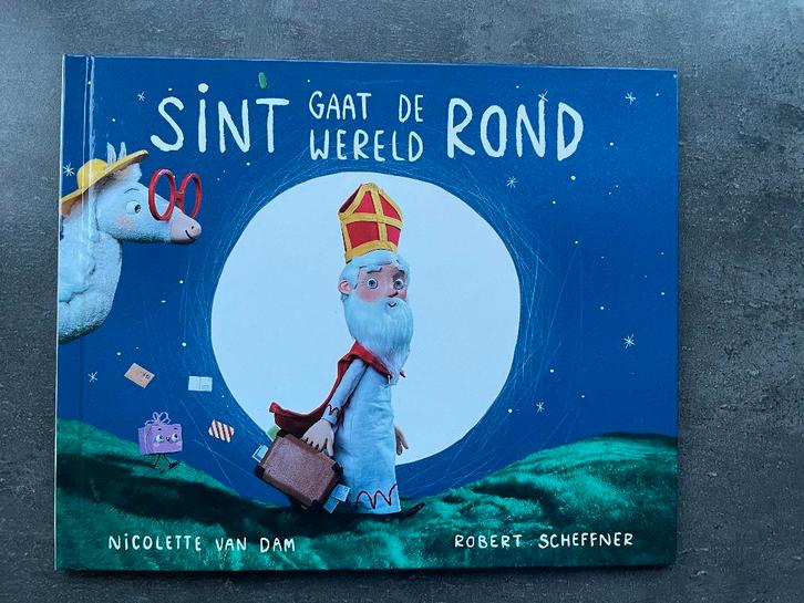 Sint gaat de wereld rond van Nicolette van Dam, Diversen, Sinterklaas, Gebruikt, Ophalen