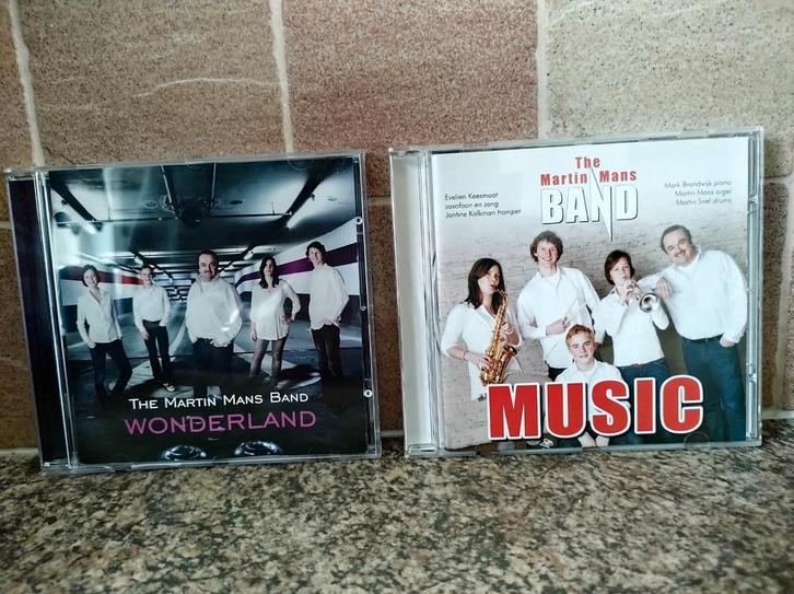 2 CD's van: The Martin Mans band. Wonderland en Music, Cd's en Dvd's, Cd's | Filmmuziek en Soundtracks, Zo goed als nieuw, Ophalen of Verzenden