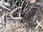 Ongeveer 10 oude fietsen, Ophalen