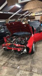Mazda mx5 na in onderdelen, Ophalen