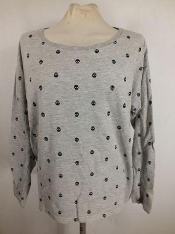 Grijs damesshirt met schedeltjes.Mt M.Merk H&M beschikbaar voor biedingen