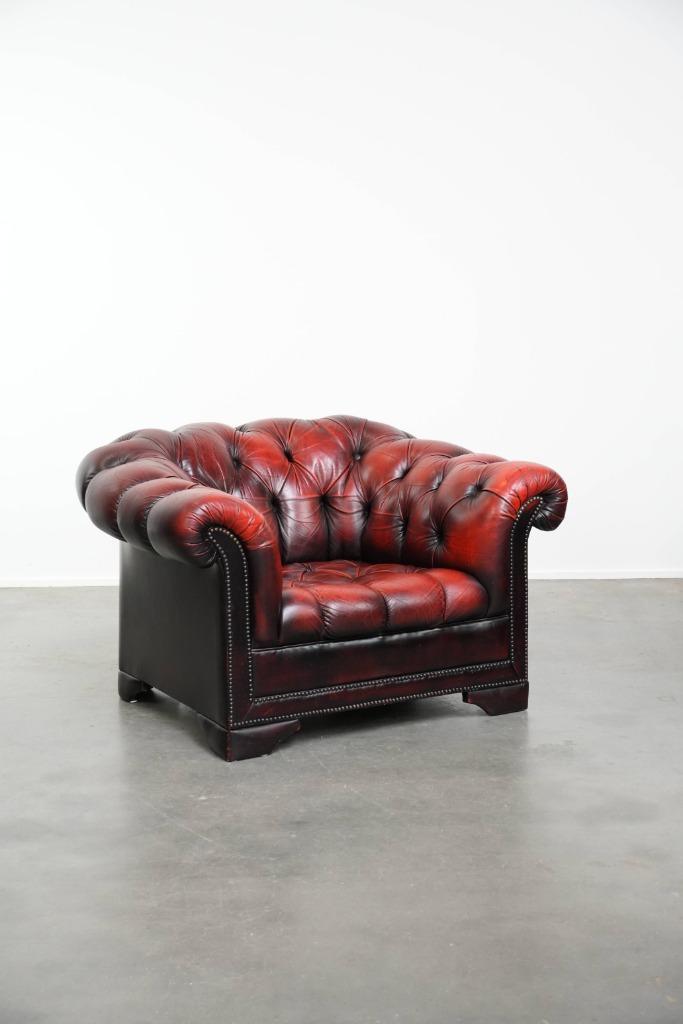 Klassieke rode rundleren chesterfield buttonseat fauteuil, Huis en Inrichting, Fauteuils, Gebruikt, 100 tot 125 cm, Minder dan 75 cm
