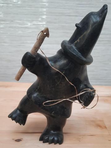 INUIT JAGER EN IJSBEER TRANSFORMATIE BEELD beschikbaar voor biedingen