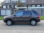 Kia Sportage 2.0 CVVT M-bition Cruise*Half leder*Trekhaak*St, Auto's, Kia, 1442 kg, 4 cilinders, Bruin, Leder en Stof